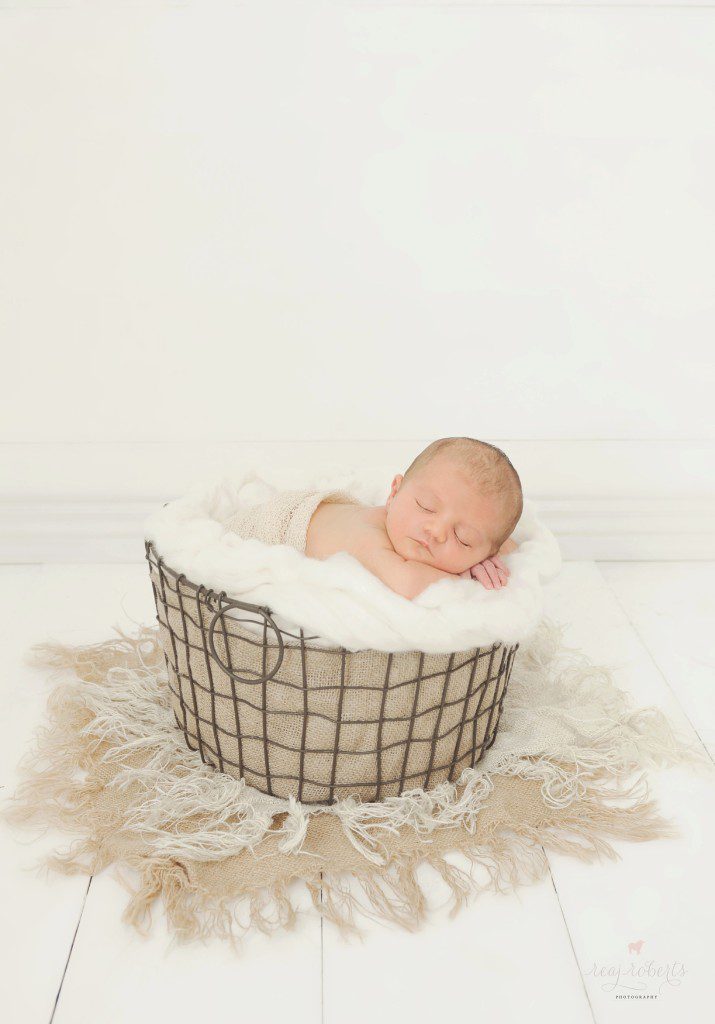 Baby boy in basket