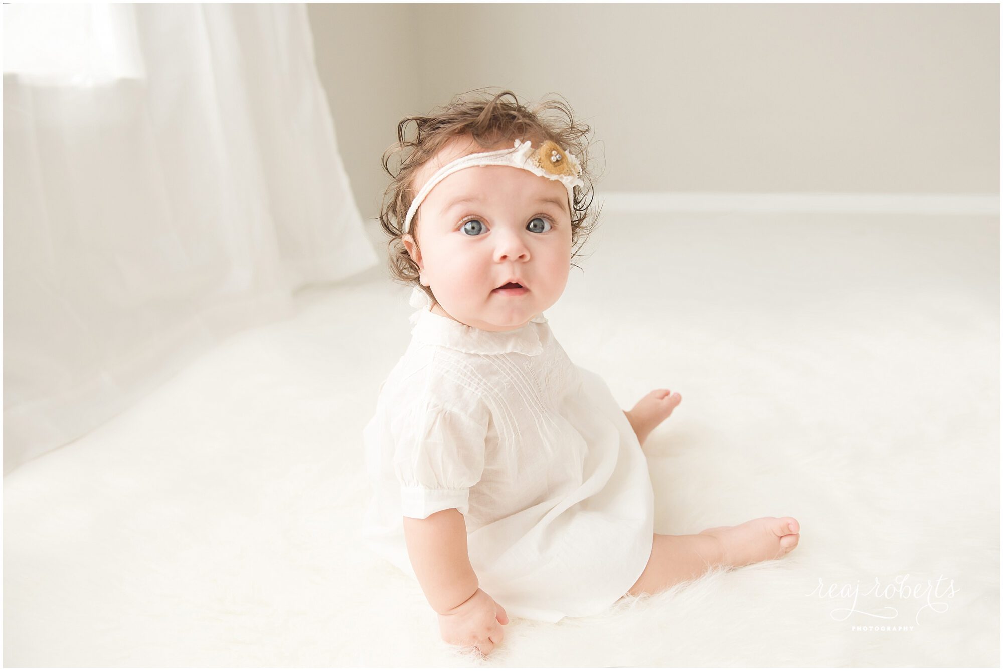 Baby girl blue eyes brown hair | Reaj Roberts Photography