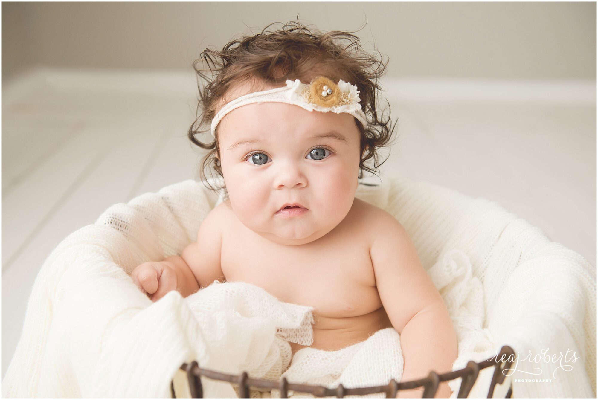 Baby girl blue eyes curly brown hair | Chandler, AZ | Reaj Roberts Photography