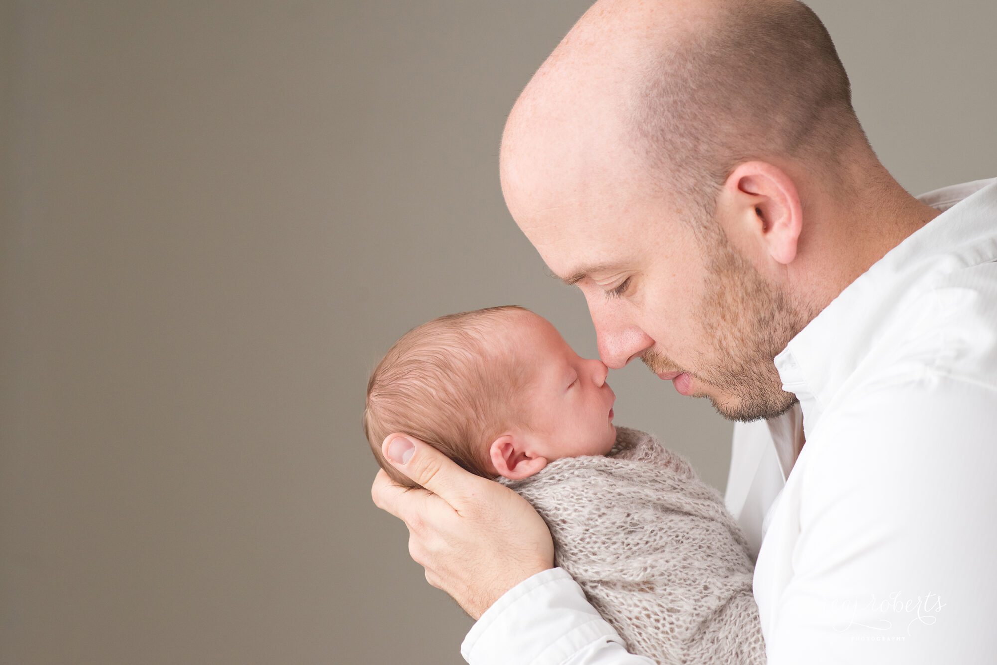 Newborn with dad nose to nose pose | Organic Newborn Photographer Chandler, AZ Reaj Roberts Photography