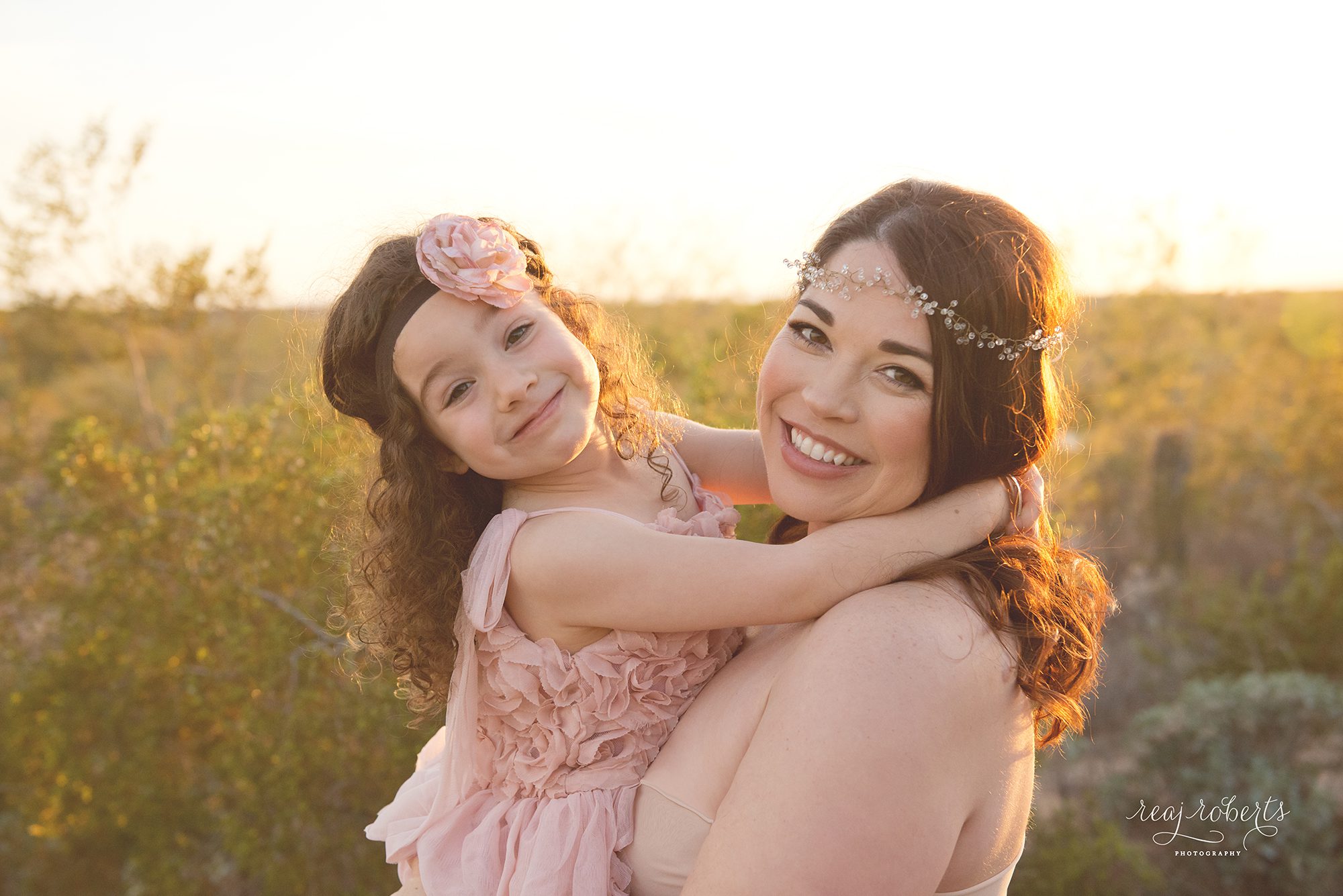desert sunset maternity photos with older sibling