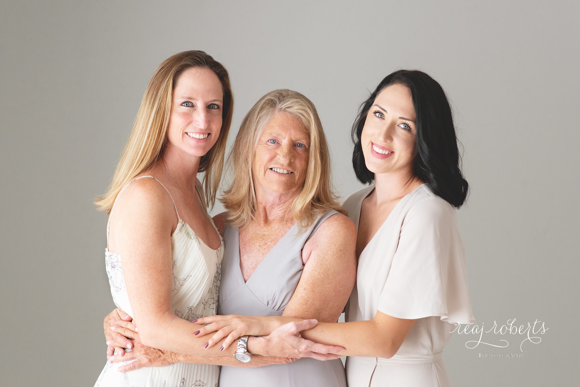 Grandmother, mother, and daughter photo | Reaj Roberts Photography
