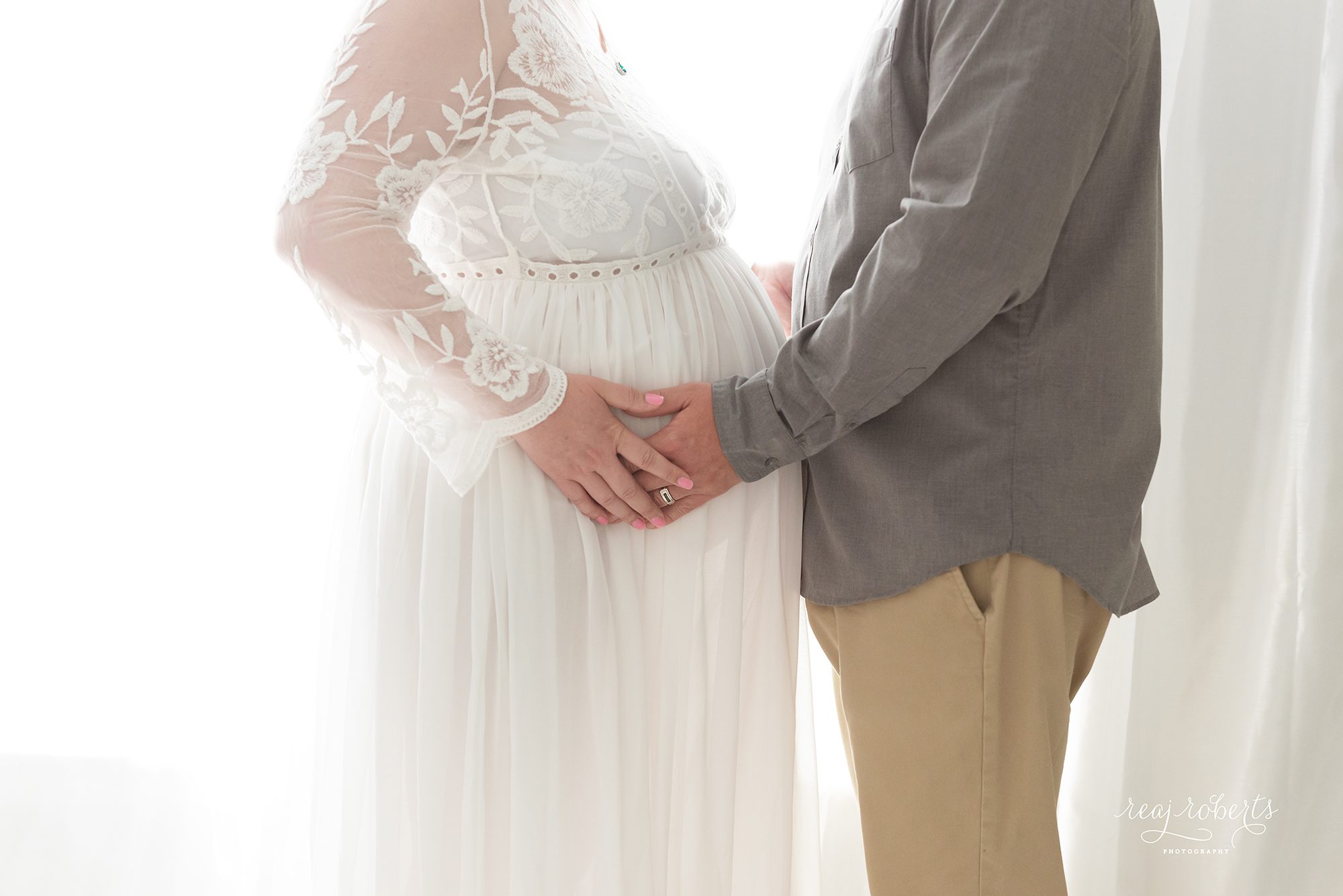 maternity session wearing white lace gown | Reaj Roberts Photography