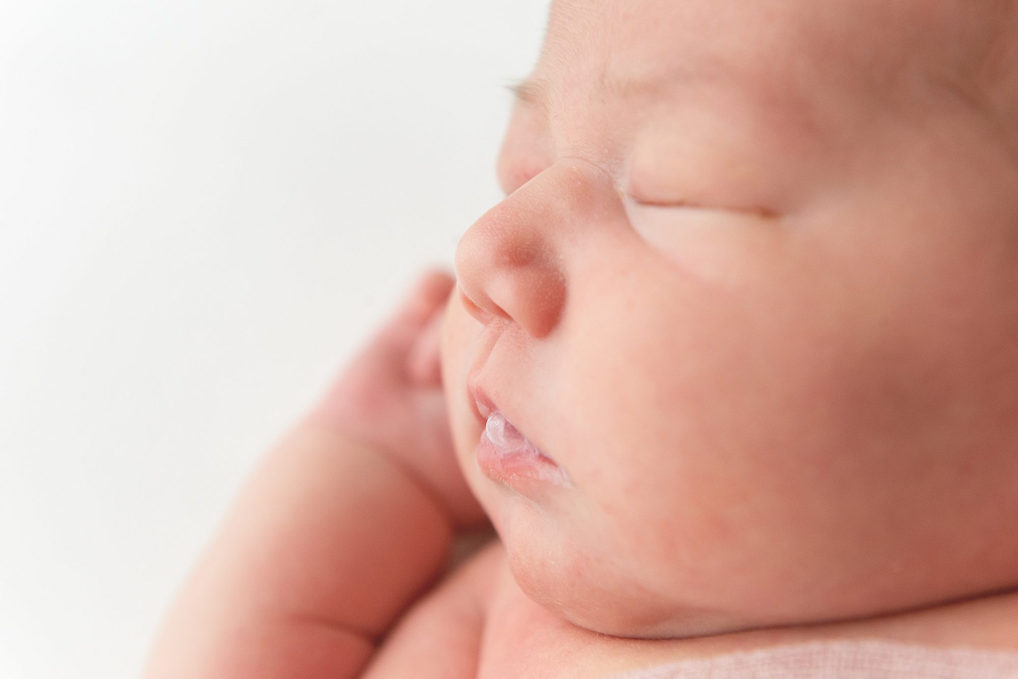 newborn chubby cheeks lips blowing raspberries | Scottsdale Newborn Photographer | Reaj Roberts Photography