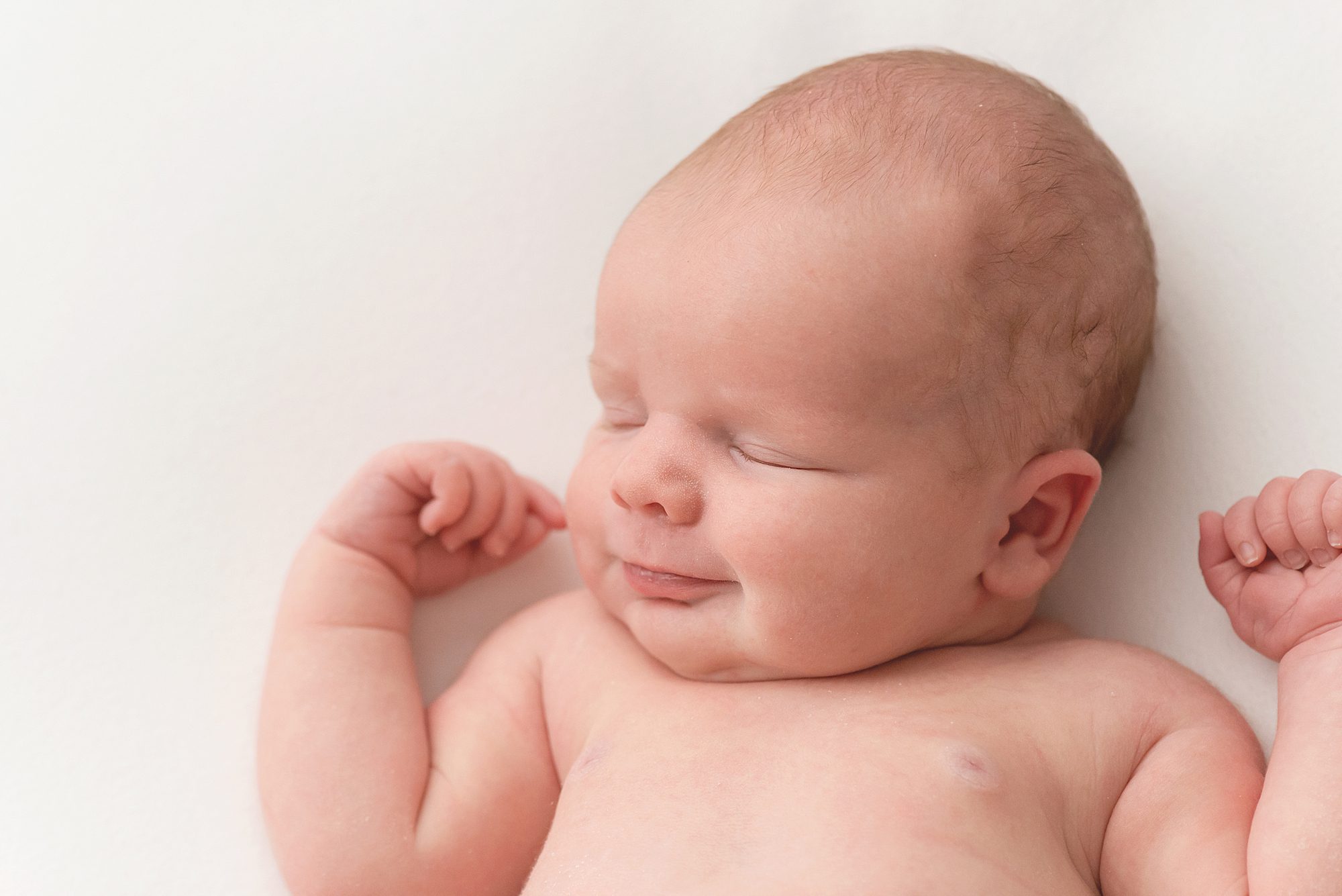 newborn baby boy smiling photos | Scottsdale newborn photographer | Reaj Roberts Photography