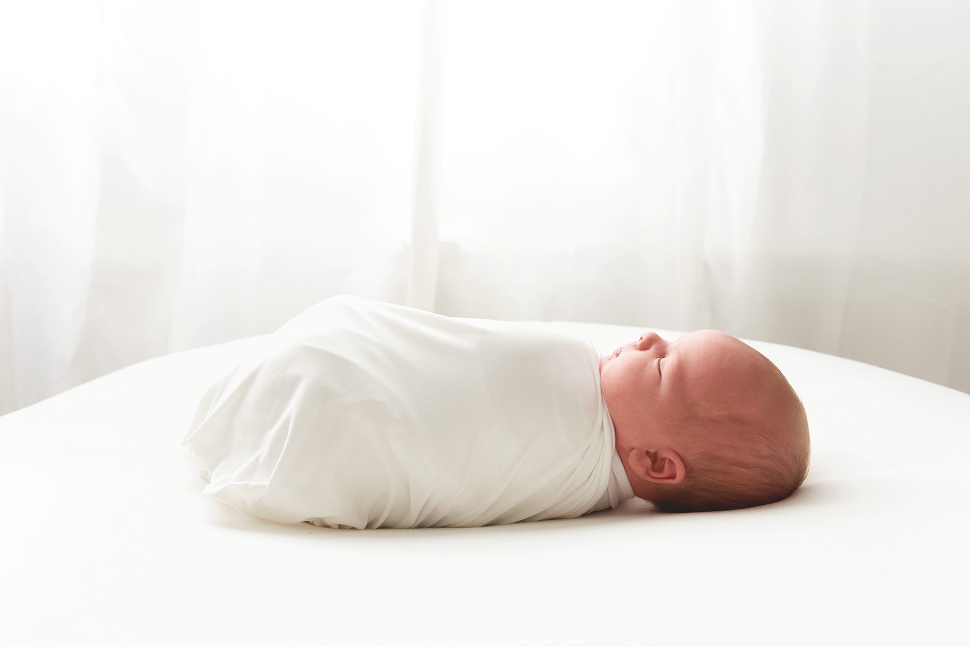 newborn swaddled profile | Scottsdale newborn photographer | Reaj Roberts Photography