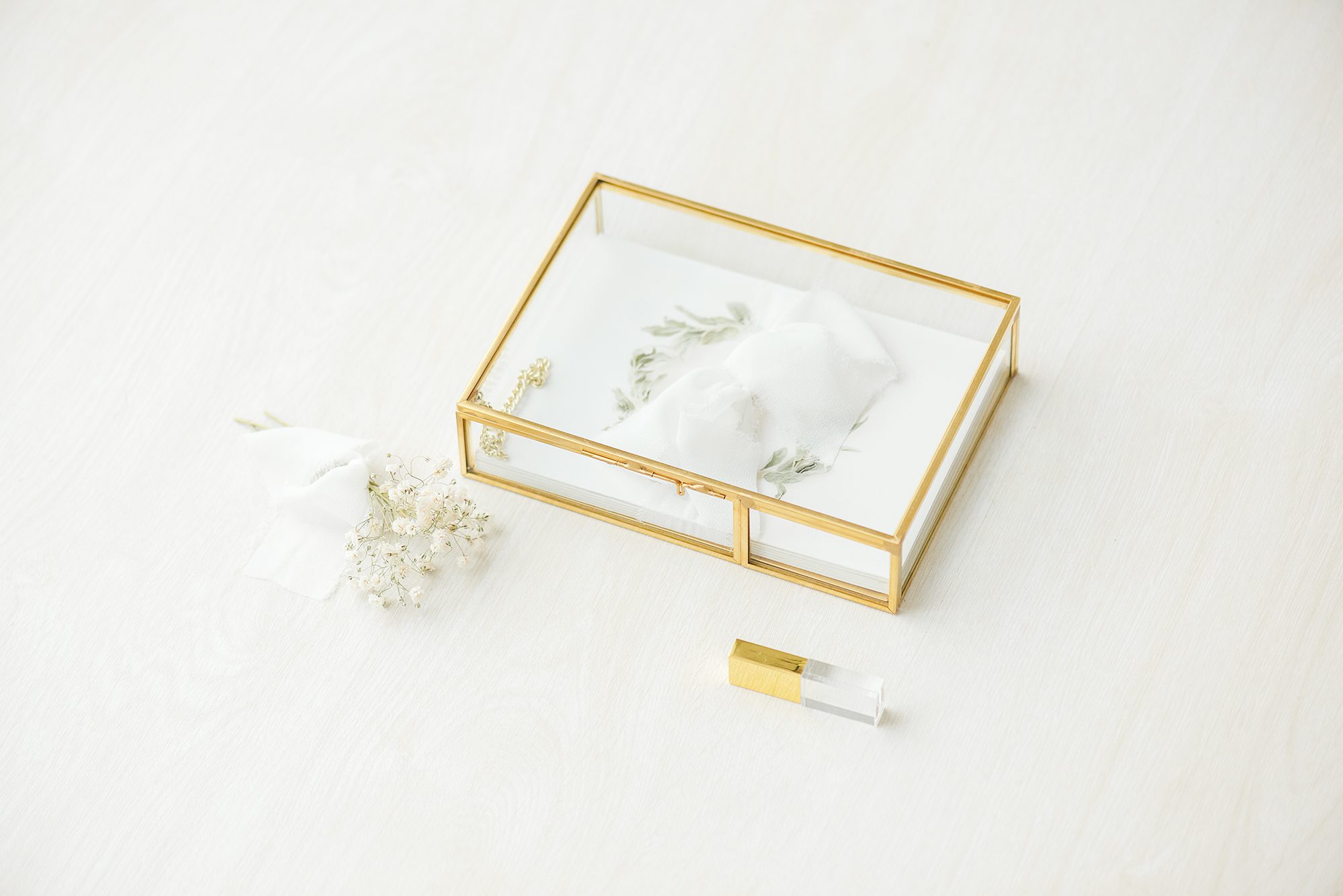 set of proofs in brass box with crystal USB