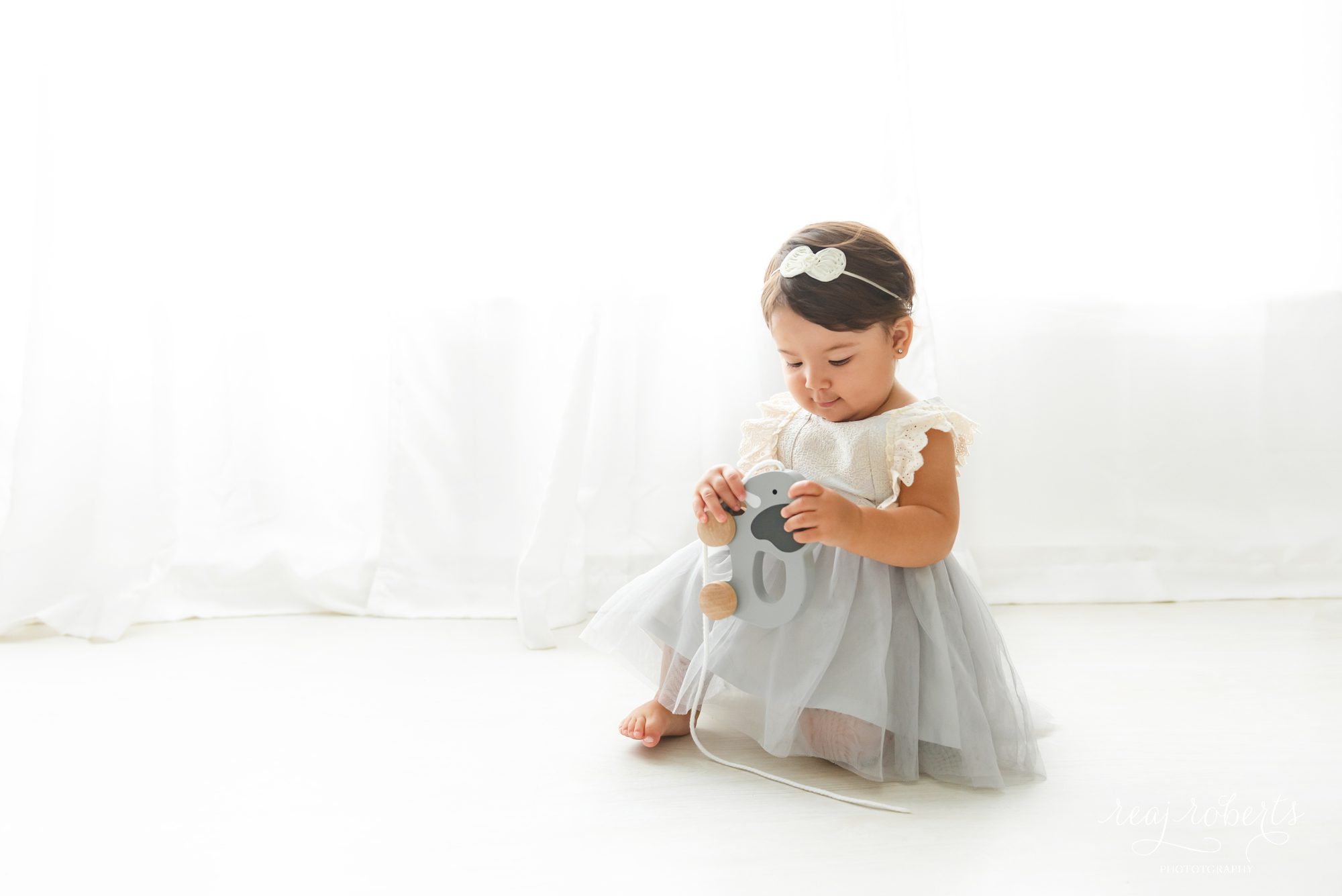 timeless first birthday photos by Reaj Roberts Photography