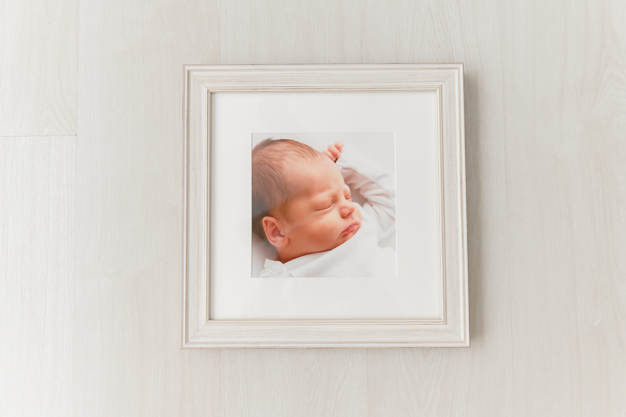 professional custom framing for newborn photos in Chandler, AZ | Reaj Roberts Photography