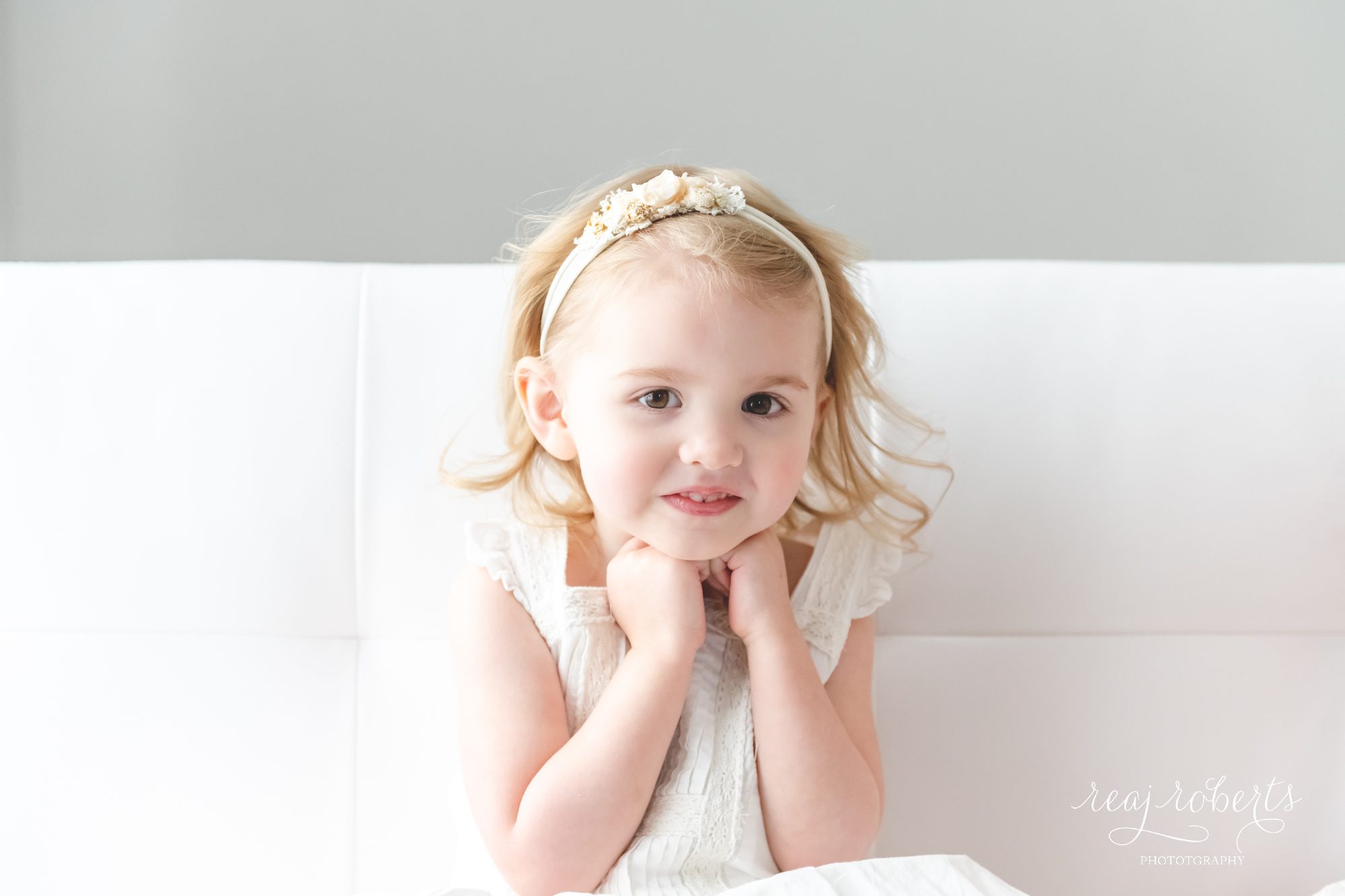 cute girl with blonde hair and curls | Reaj Roberts Photography 